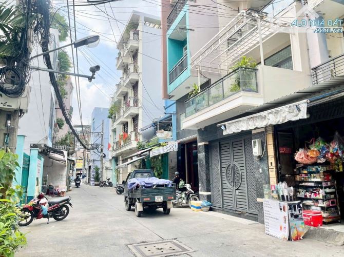 Cần bán gấp căn nhà Lạc Long Quân, p11, Tân Bình, Hồ Chí Minh. 101M2, NỞ HẬU - 6
