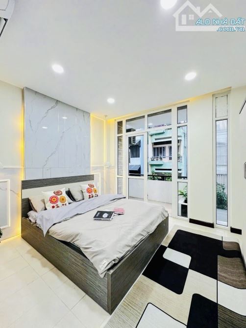 Bán nhà Phú Nhuận - khu phân lô - xe hơi - 5 tầng - kimh doanh - 8