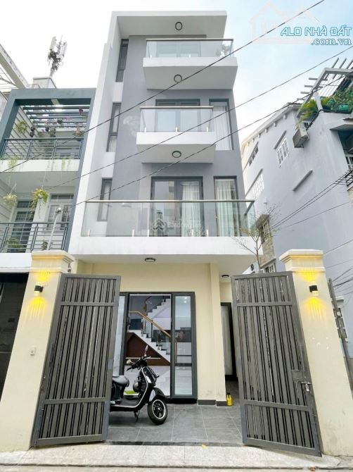 Bán nhà  hẻm xe hơi  Lê Văn Sỹ, P13, PN  khu VIP, (4x14m) 4 tầng  chỉ 12,8 tỷ TL