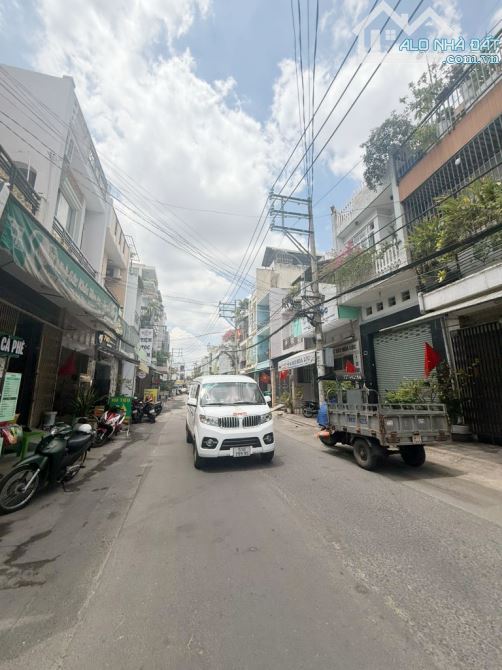 BÁN NHÀ MT KINH DOANH ĐƯỜNG 12M XE HƠI NGỦ NHÀ NGANG 8M 100M2 CẠNH LÊ VĂN QUỚI GIÁ 9.X TỶ