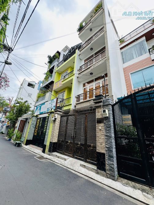 Nhà mặt tiền đường Nguyễn Bá Tòng, P11 - DT: 4x17m [vuông vức] 4 Lầu Nhà Đẹp. Giá 9.9 tỷ
