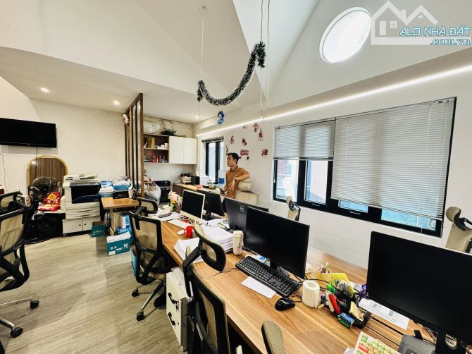 Bán nhà phố Đặng Văn Ngữ, Đống Đa, ô tô tránh, tiện KD, 4 tầng 106m2 giá 35 tỷ