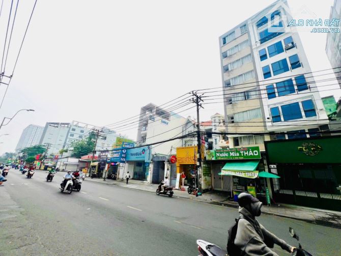 Bán Nhà MT Nguyễn Xí P26 BT, DT 5.6x32m, Hầm 8 Tầng ST Thang Máy, HĐT 125tr/th, Giá 52 Tỷ