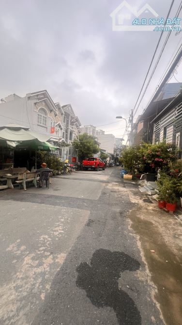BÁN NHÀ HẺM XE HƠI QUAY ĐẦU- 3TẦNG BTCT- NGANG 4x13- 4PN- THÔNG LÝ PHỤC MAN Q7  HƠN 7TỈ TL - 1