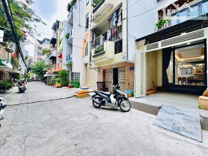 Bán nhà 4 lầu mặt tiền đường 7m ngay Ung Văn Khiêm - Xô Viết Nghệ Tĩnh. Giá 13.9 tỷ - 1