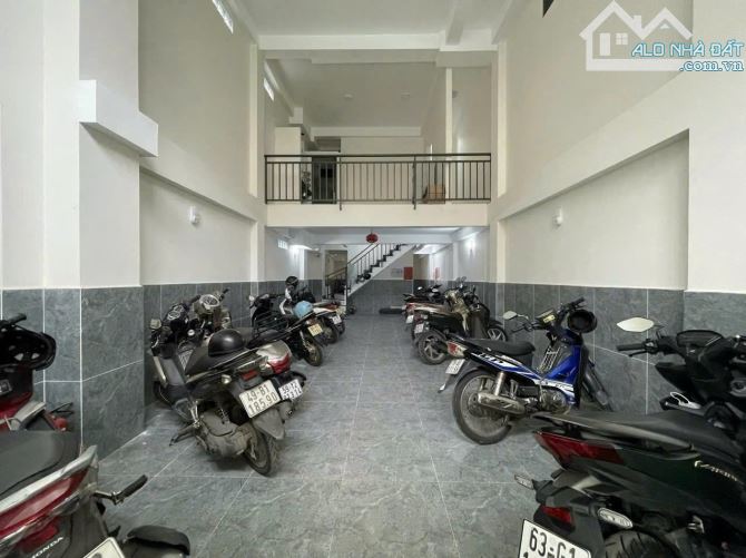 Bán tòa CHDV Bùi Đình Túy P24 dt 5x22 kết cấu 5 lầu 23P khai thác doanh thu ổn định - 1