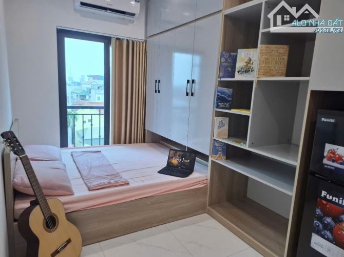 Tòa CHDV phố Chùa Bộc, 70m2, 6 tầng, 17 phòng, dòng tiền ổn định, thang máy, đầy đủ PCCC - 1