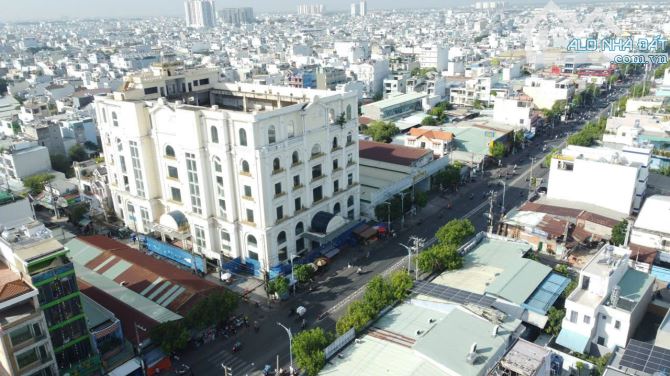 bán toa nhà 1 hầm , 8 lầu đường lê văn quới , quận binh tân - 1