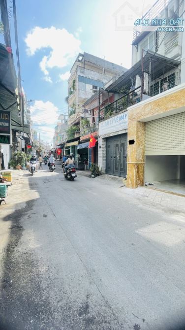 Mặt tiền kd đường nhựa Tân Bình-100m2 - 5 tầng BTCT. - 1