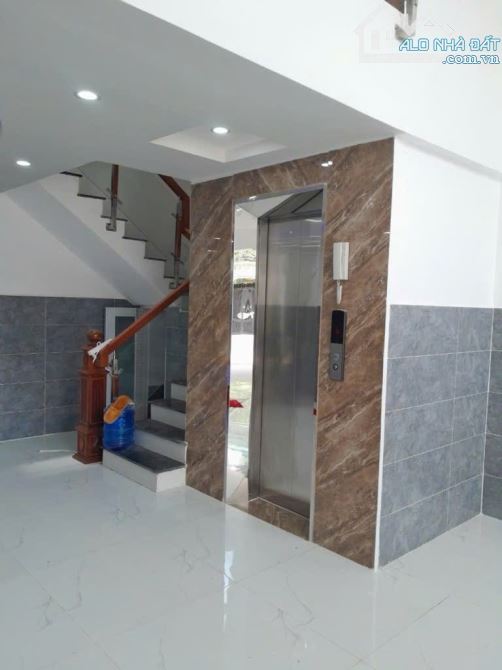 TÒA NHÀ TO RỘNG-DÒNG TIỀN CAO-GIÁ TỐT- BÁN NHÀ CHDV 100M2-6 TẦNG-MẶT TIỀN LÊ LIỂU TÂN PHÚ - 2