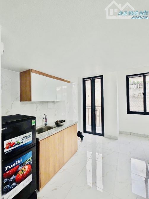 Bán siêu phẩm ccmn Đội Cấn, DT 50m2 x 7T, sổ đỏ vuông đẹp, 10 phòng cho thuê, chỉ 16 tỷ 7 - 2