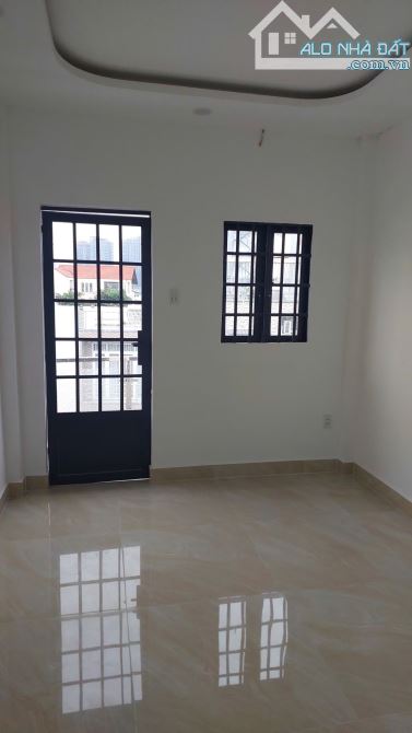Nhà mới 1 Trệt 3 Lầu 3x10m 3 Phòng 3 wc Hẻm 469 Đoàn Văn Bơ Giá 18 Triệu - 3
