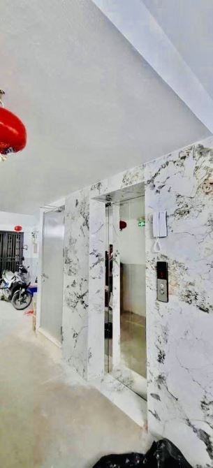 Bán siêu phẩm ccmn Đội Cấn, DT 50m2 x 7T, sổ đỏ vuông đẹp, 10 phòng cho thuê, chỉ 16 tỷ 7 - 5