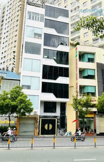 Ban gấp nhà MT đường Nguyễn Văn Trỗi DT 5,5m x 12m Kết cấu 8 Tầng thang máy giá 29 tỷ
