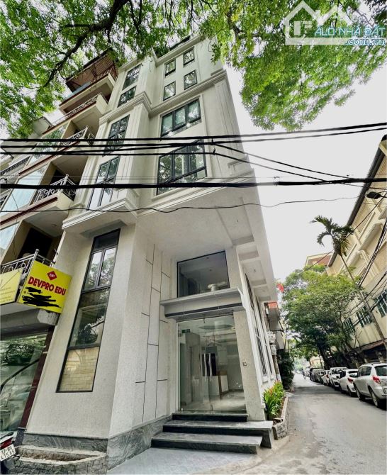 Cho thuê tòa Văn phòng phố Mai Dịch, Cầu Giấy. 70m, 7T thang máy. Oto dừng đỗ