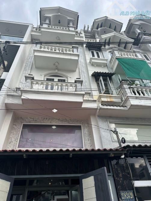 Nguyễn duy cung p12 gò vấp. 4 m dài 14 m -Trệt-Lửng -4lầu nhà nằm trong khu phân lô đồng b - 1