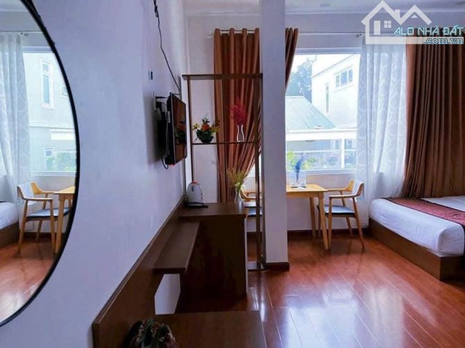 KHÁCH SẠN MT TRUNG TÂM ĐÀ LẠT 207m2 NỞ HẬU 4 TẦNG 21 PHÒNG HĐ THUÊ 55TR/THÁNG - 2