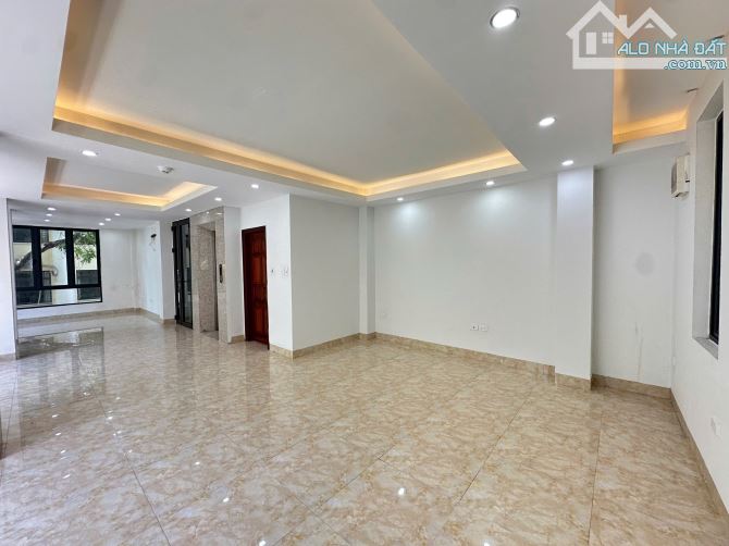 Cho thuê tòa Văn phòng phố Mai Dịch, Cầu Giấy. 70m, 7T thang máy. Oto dừng đỗ - 2