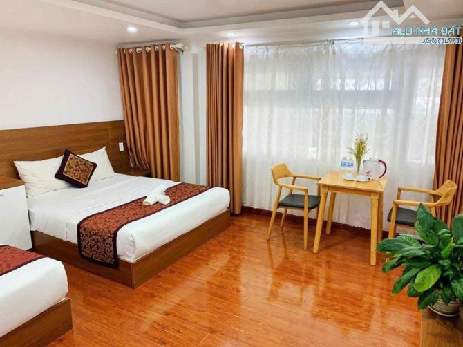 KHÁCH SẠN MT TRUNG TÂM ĐÀ LẠT 207m2 NỞ HẬU 4 TẦNG 21 PHÒNG HĐ THUÊ 55TR/THÁNG - 8