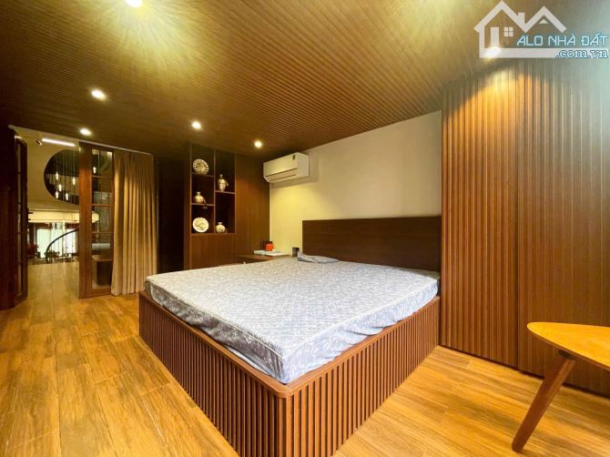 Nhà 5 tầng thang máy mặt đường Phố Cấm - 9