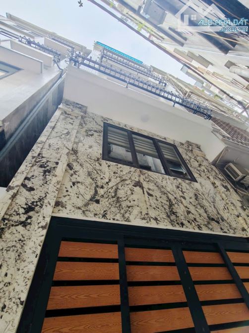 6 tầng thang máy xây mới 20m ra Phố Thái Hà, oto qua, full nội thất 40m2. Giá 18.6 tỷ