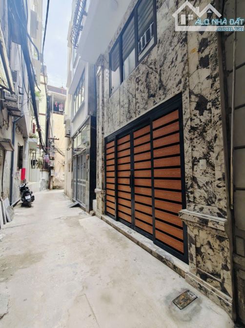 6 tầng thang máy xây mới 20m ra Phố Thái Hà, oto qua, full nội thất 40m2. Giá 18.6 tỷ