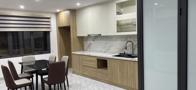 6 tầng thang máy xây mới 20m ra Phố Thái Hà, oto qua, full nội thất 40m2. Giá 18.6 tỷ