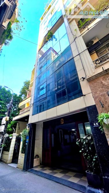 BÁN TÒA VĂN PHÒNG VÀ CĂN HỘ VŨ PHẠM HÀM, DT 88M 7 TẦNG, Ô TÔ, GIÁ 41 TỶ