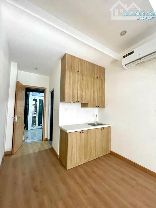 Bán nhà Bùi Xương Trạch, ô tô vào nhà, 7 tầng, MT5m, gồm 19P ngủ, đang cho thuê 100 triệu.