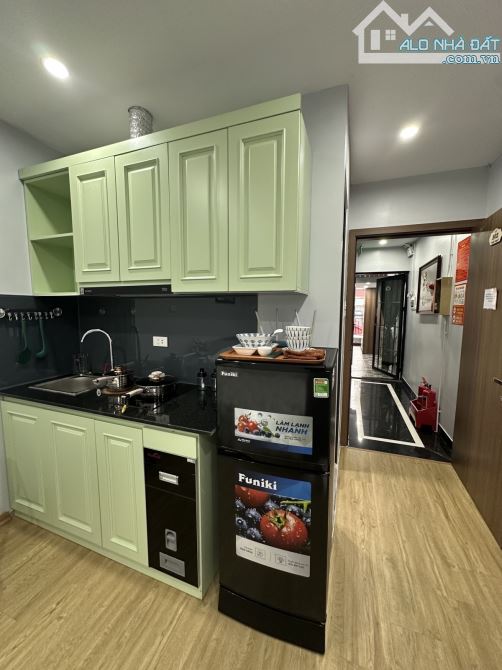 Bán CHDV Hoàng Mai 46m2 lô góc cách oto 50m 8 phòng thang máy 12.8 tỷ