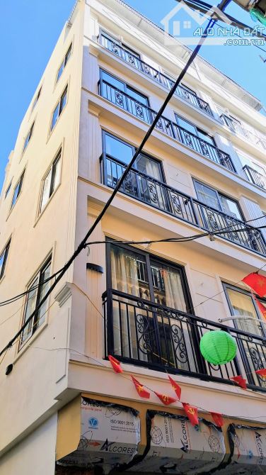 Bán nhà HOÀNG QUỐC VIỆT. Mặt ngõ thông, oto tránh. 5 tầng THANG MÁY. Lô góc 3 mặt thoáng.