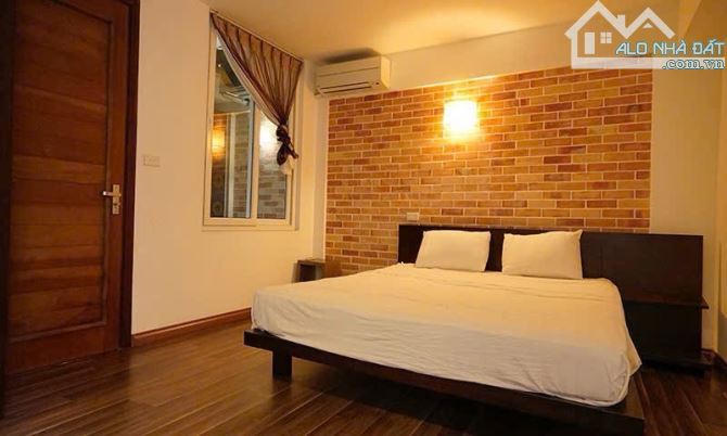 Tòa Apartment Đặng Thai Mai 80m x 6T, MT 5.6m, Lô góc, TM, Ô tô, Full Nt, 26 tỷ