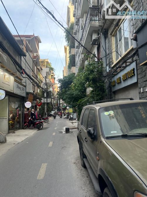 7T thang máy mặt phố Đê La Thành, lô góc bề thế, gara, thông sàn, 60m2 24.5 TỶ