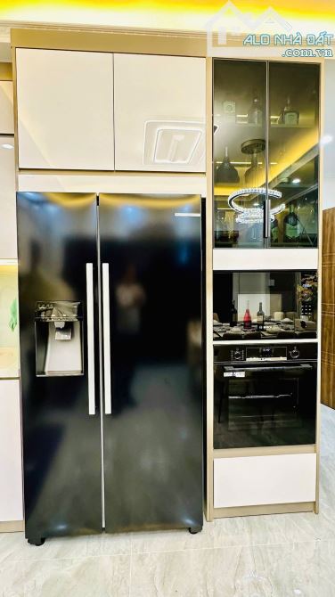 Sang trọng đẳng cấp 7 tầng thang máy Nguyễn An Ninh oto đỗ 30m, 45m2 sổ. Giá 15.8 tỷ