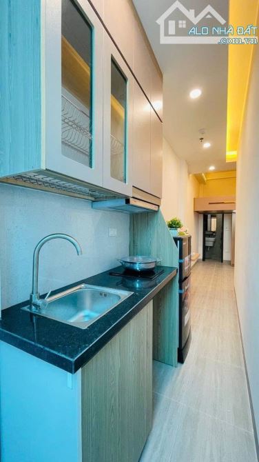 Bán tòa nhà căn hộ dịch vụ cao cấp Đống Đa - 7 tầng thang máy, 22 phòng, dòng tiền 90 tr