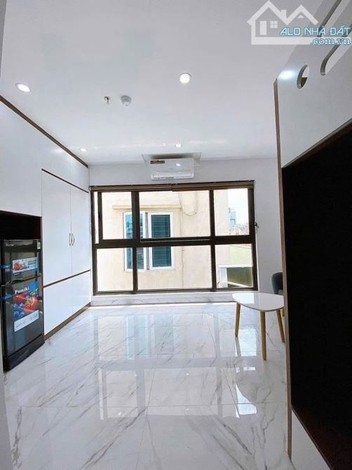 KHƯƠNG TRUNG-TOÀ CHDV 104Mx7TẦNG THANG MÁY-PHÂN LÔ Ô TÔ-DÒNG TIỀN 140Tr-30TỶ