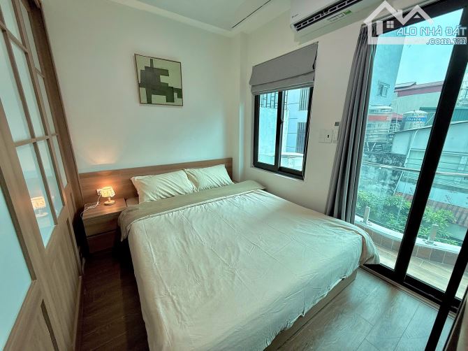 Toà CHDV Huỳnh Thúc Kháng, vỉa hè ô tô tránh, 8T thang máy, 11P 1n1k + MBKD, DT100tr/th