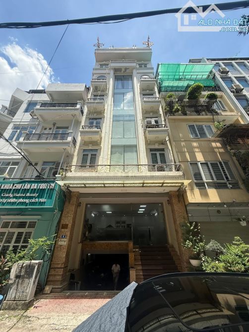 TOÀ NHÀ 9 TẦNG PHỐ TRẦN DUY HƯNG, CẦU GIẤY - 100m x 7,5m MẶT TIỀN - VỈA HÈ RỘNG - Ô TÔ QUA