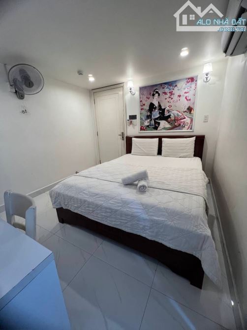 Sang khách sạn 14 phòng/Có thang máy mặt tiền, khu Trung Sơn. - 1