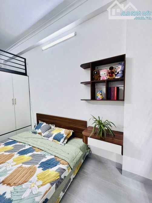 Toà CHDV Trường Chinh ngõ thông rộng thoáng 63m2*6T TM 15PN gần HV Ngân Hàng DT 1 tỷ/năm