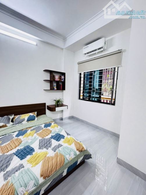 Toà CHDV Trường Chinh ngõ thông rộng thoáng 63m2*6T TM 15PN gần HV Ngân Hàng DT 1 tỷ/năm