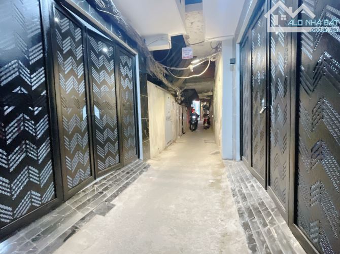 Bán 1Nhà Tặng 1Nhà 75m Nở Hậu x10Ngủ 2Thang Máy 2ÔTô Tải Tránh KD Dòng Tiền GT Thuận Tiện