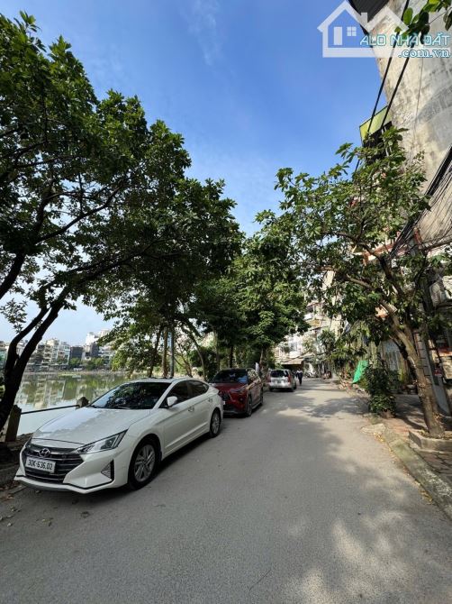 Bán nhà Phương Mai 53m2 mặt hồ đường ô tô vỉa hè rộng kinh doanh tốt 26.95 tỷ