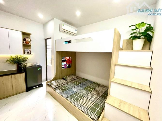 Bán Tòa căn hộ dịch vụ Phố Hào Nam - Đống Đa DT 1.3 tỷ/năm - 20pkk-TM-10ra ô tô. - 4