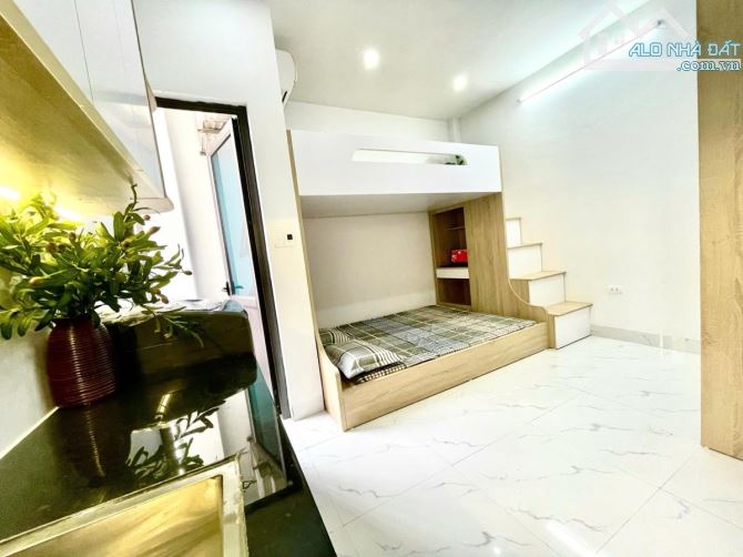 Bán Tòa căn hộ dịch vụ Phố Hào Nam - Đống Đa DT 1.3 tỷ/năm - 20pkk-TM-10ra ô tô. - 7