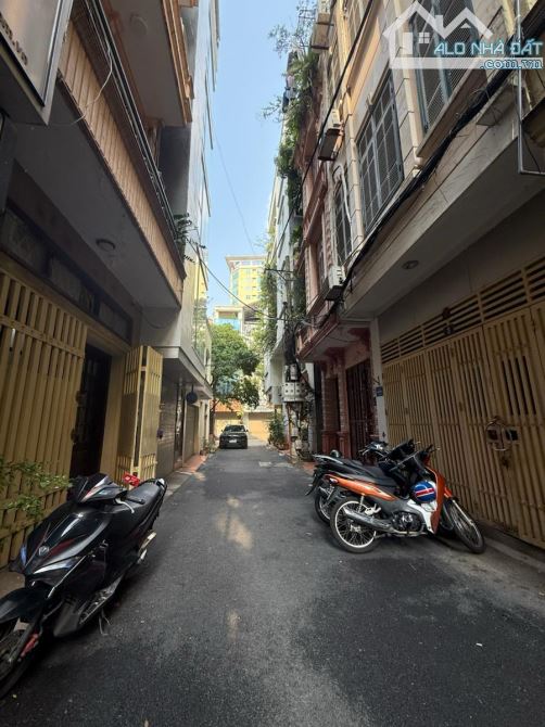 8T thang máy Phương Mai, gần phố, oto qua nhà, 2 thoáng, gara MT7m - 66m2