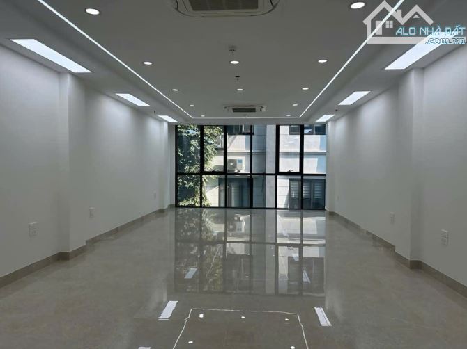 Bán Toà VP Phố Nguyên Hồng Đống Đa 70m2x8T. Thang máy. Vỉa Hè Ô Tô. Giá 36 tỷ - 2