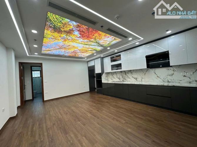 Bán Toà VP Phố Nguyên Hồng Đống Đa 70m2x8T. Thang máy. Vỉa Hè Ô Tô. Giá 36 tỷ - 5