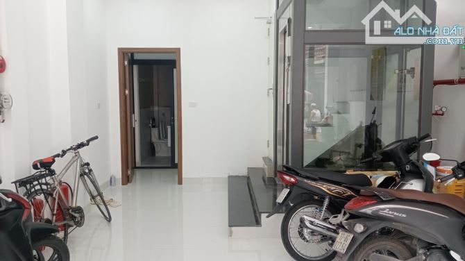 BÁN NHÀ PHÂN LÔ TRẦN ĐIỀN Ô TÔ TRÁNH VỈA HÈ KINH DOANH 60M X 6 TẦNG - GIÁ 17.5 TỶ - 1