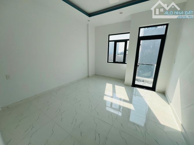 Bán gấp căn nhà 1 trệt 2 lầu 5pn dt 85m2 mặt tiền hẻm xe hơi tại P. Trung Dũng - 2